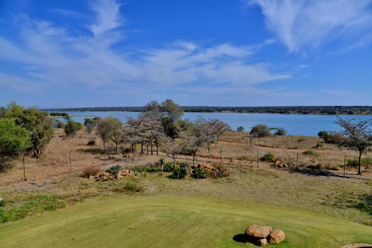 Kameeldrift Waterfront Estate & Resort Brits Bagian luar foto